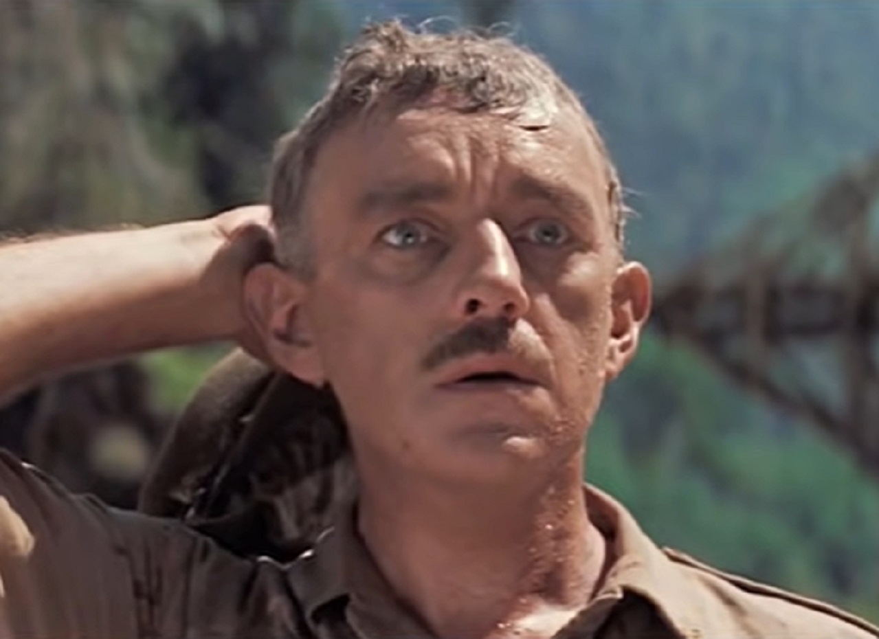 Screenshot of Alec Guinness looking upset - from The Bridge on the River Kwai (1957)