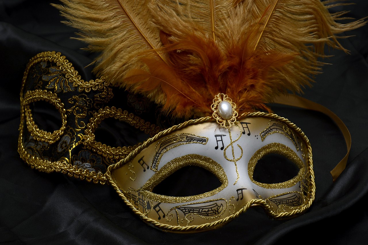Photo of white mask with feathers used in the Venice Carnival