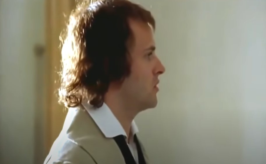 Jonny Lee Miller as Lord Byron in gray suit