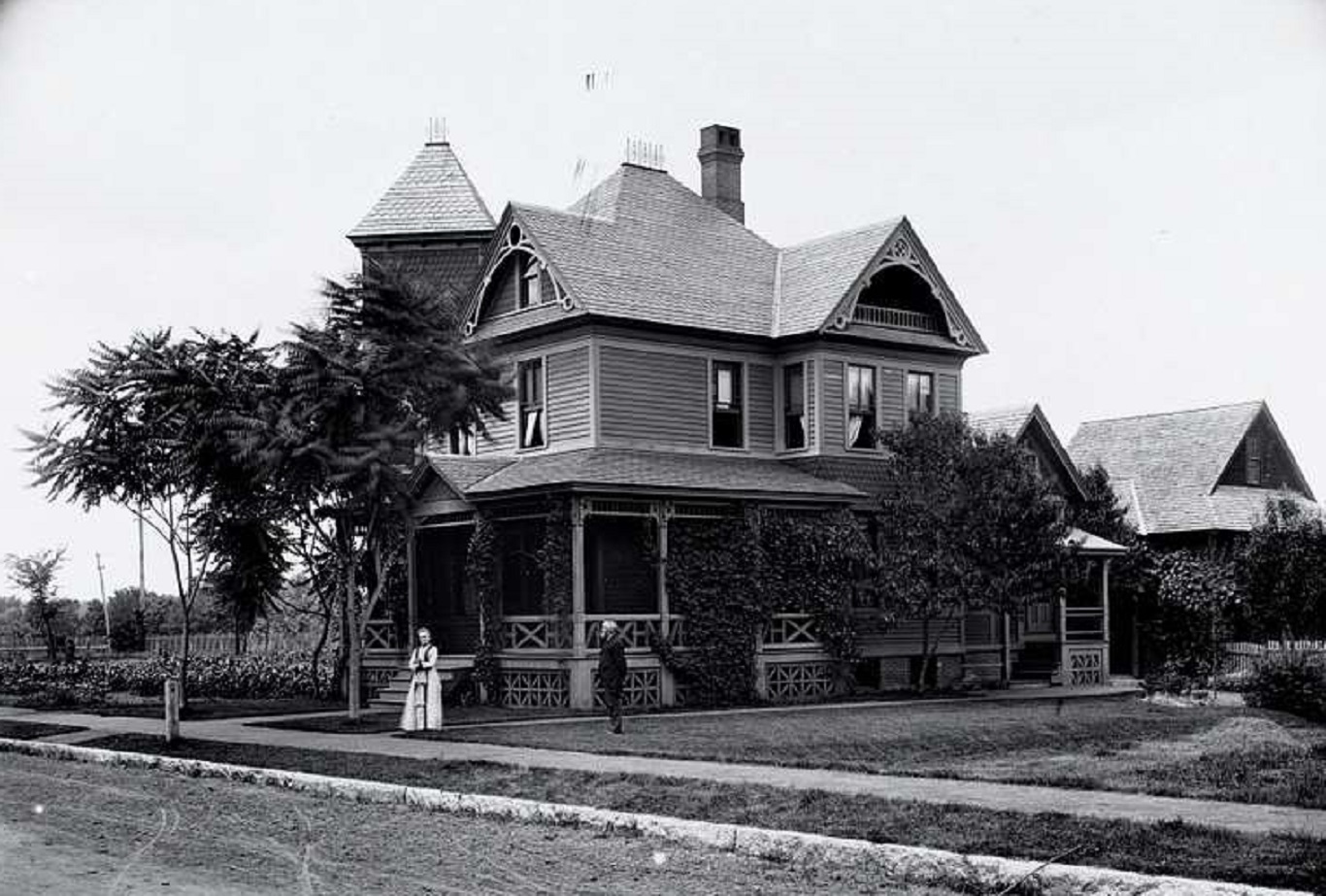 People in front of their house