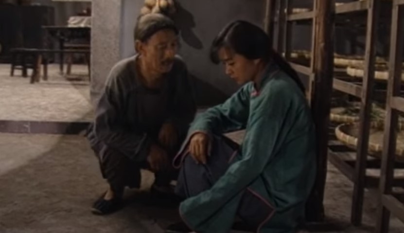 Chen Yulian in Sai Jin Hua in blue