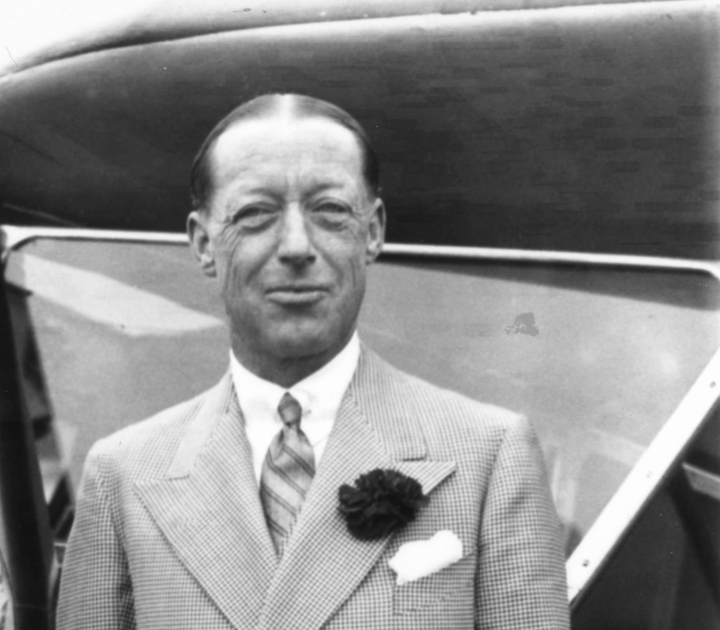 Marmaduke, Viscount Furness in suit 