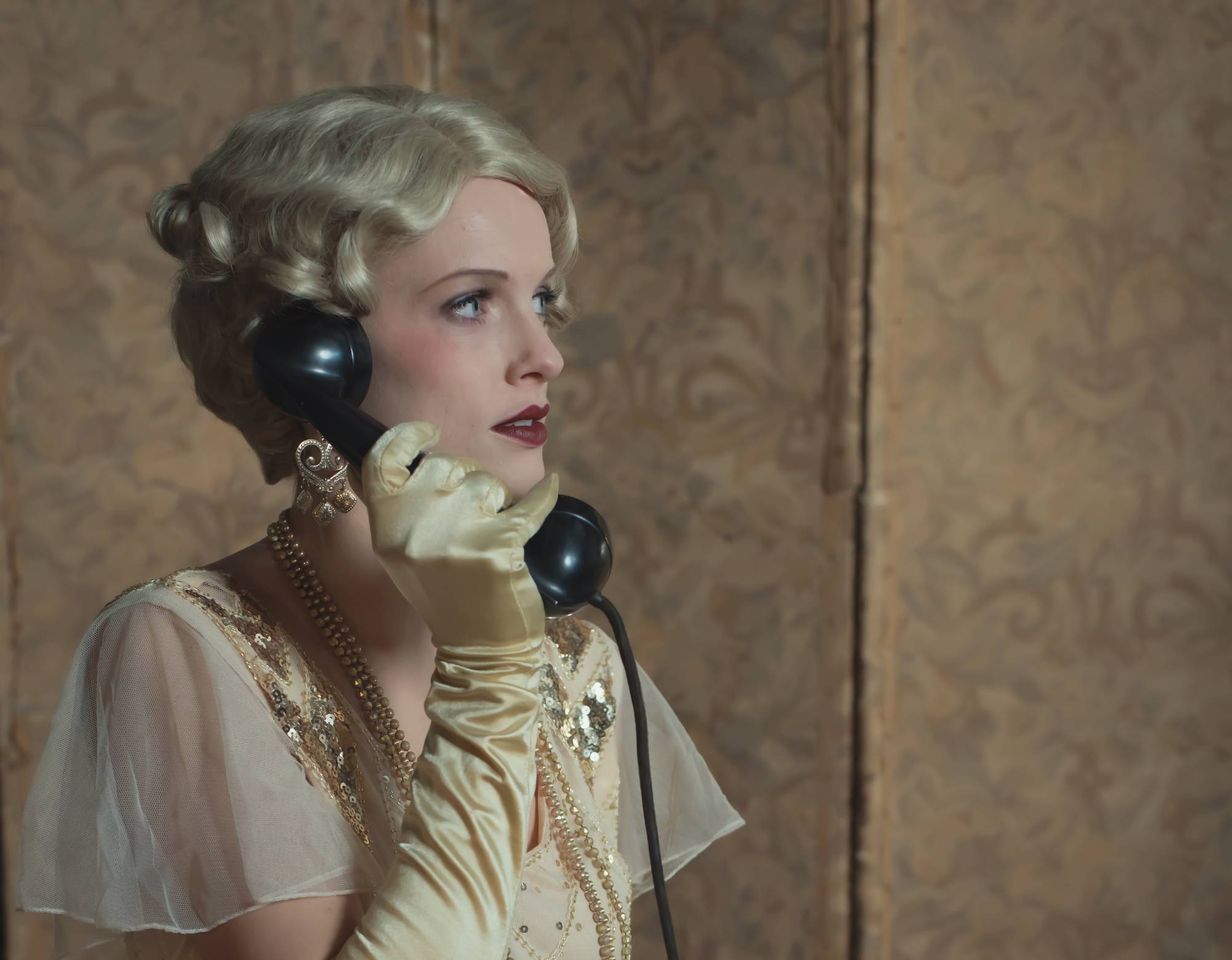 Retro 1920s fashion woman on the phone