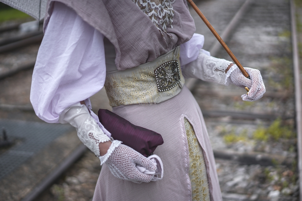 Woman 1900s in gray dress