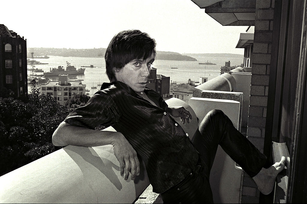 Punk rock star Iggy POP in black shirt