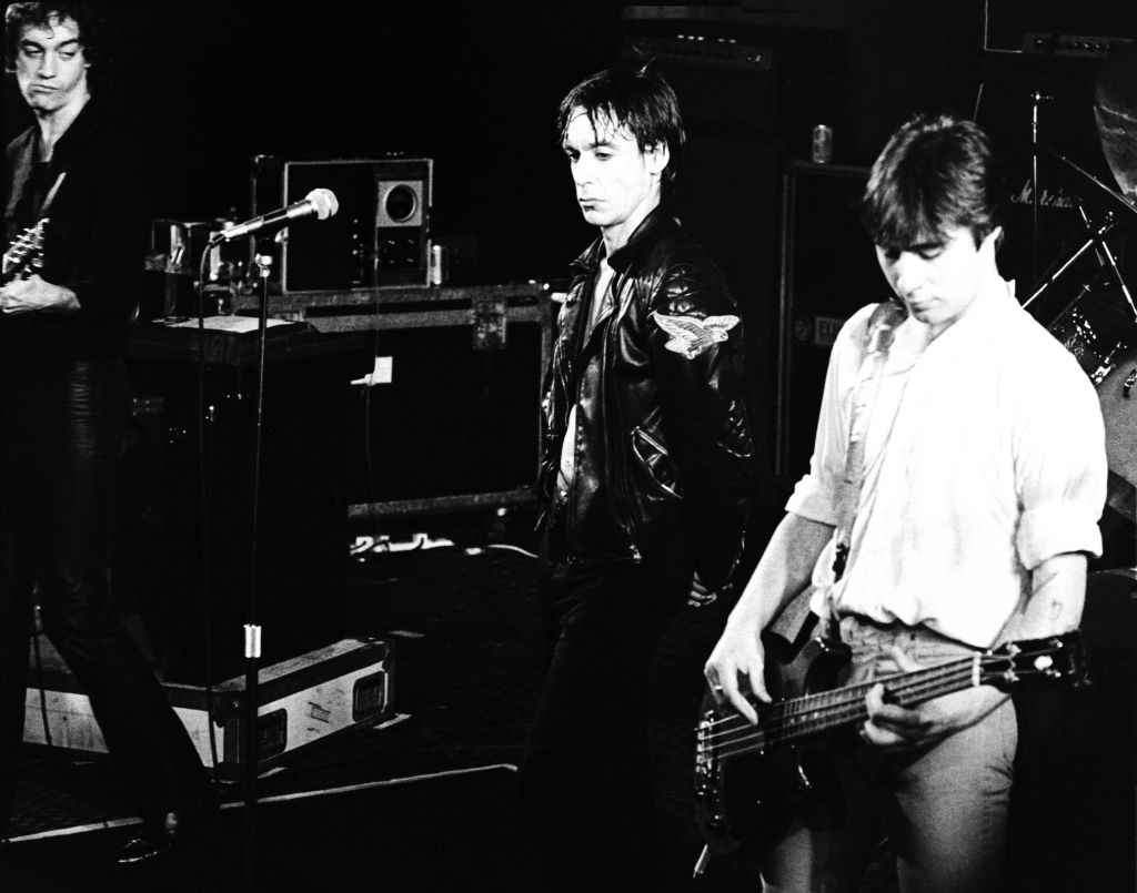 Scott Thurston, Iggy Pop and Glen Matlock perform on stage