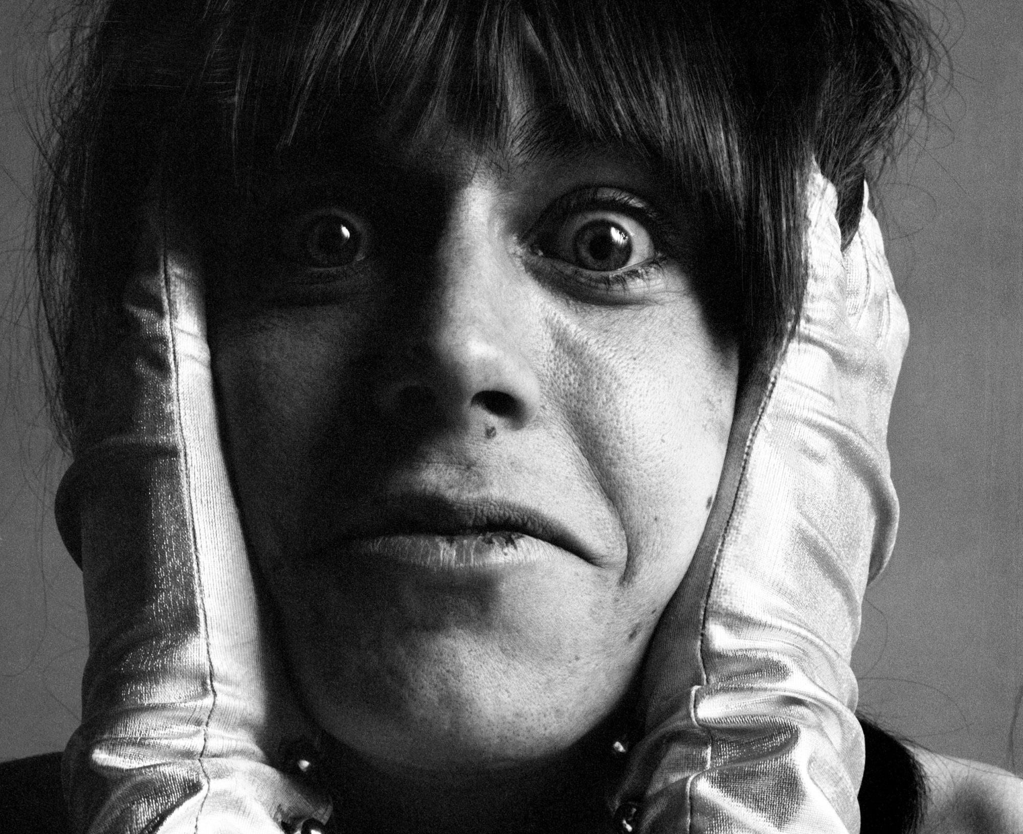 Iggy Pop, of the group the Stooges, as he poses in satin gloves