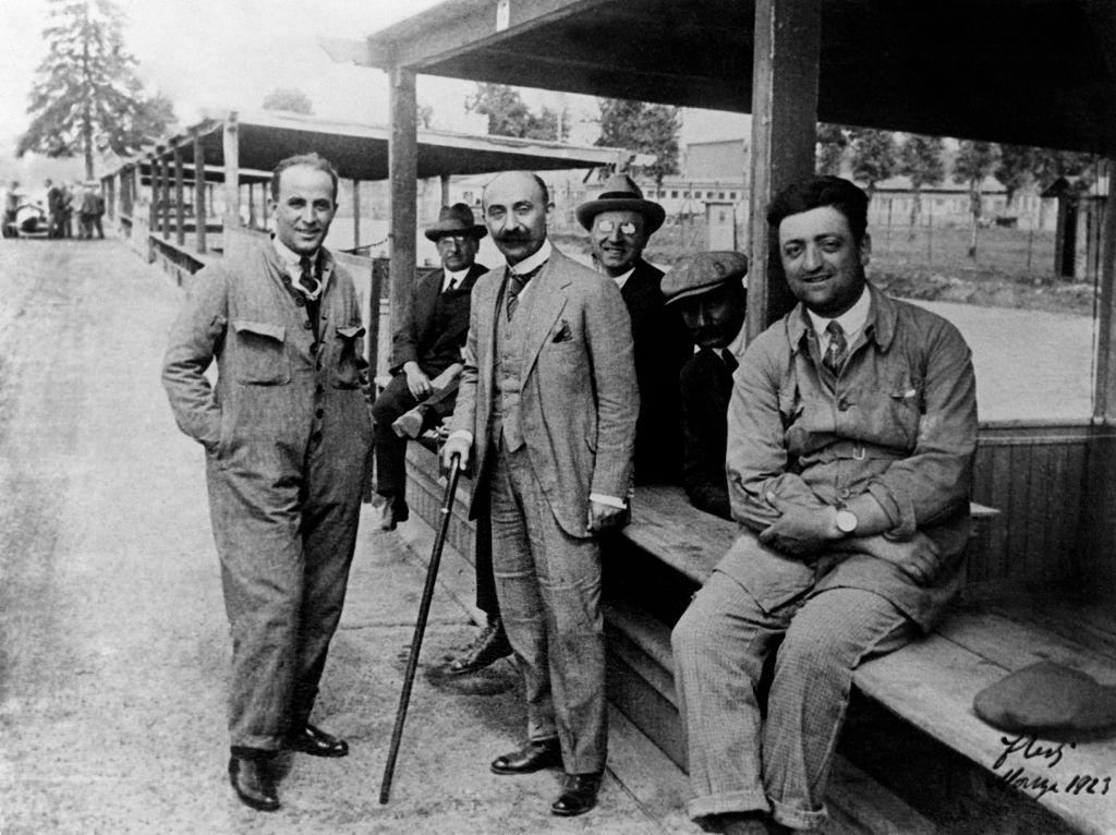 Nicola Romeo, Enzo Ferrari and Giuseppe Morosi at the Monza racetrack pits