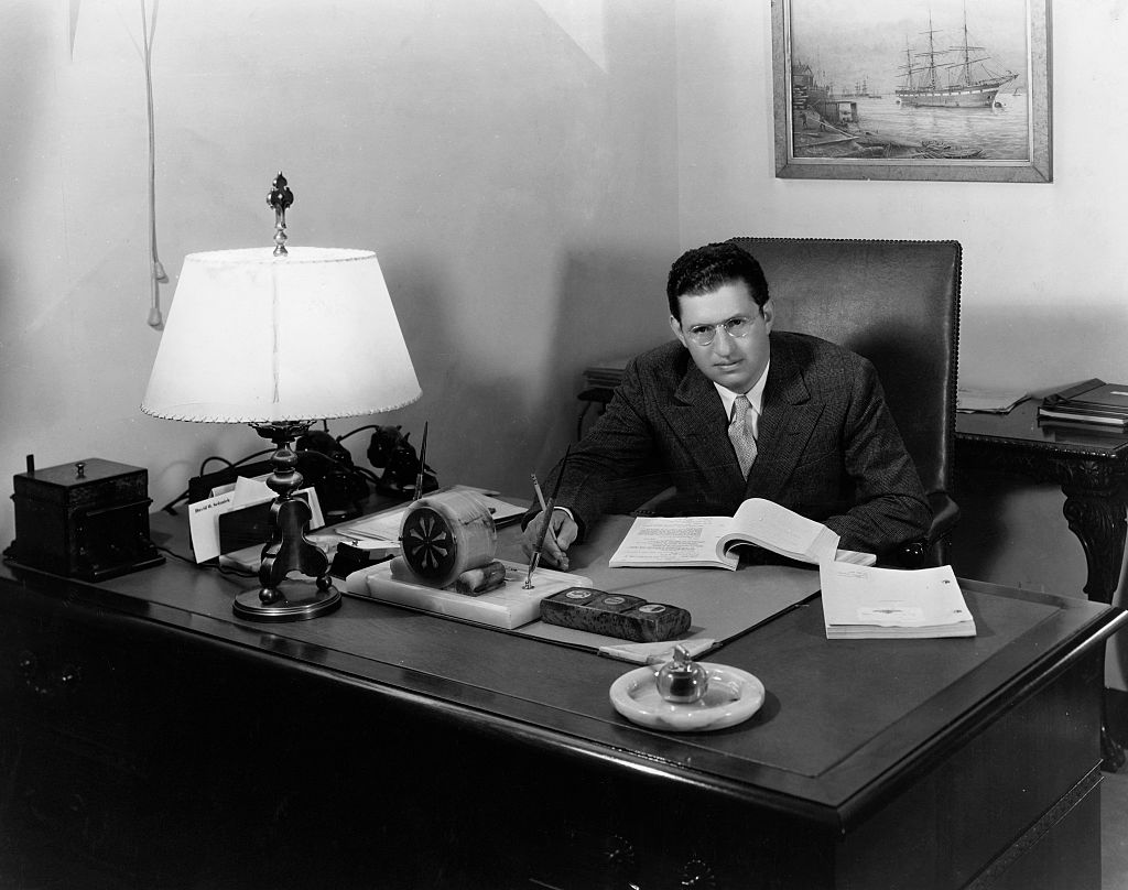 David O Selznick works at his desk