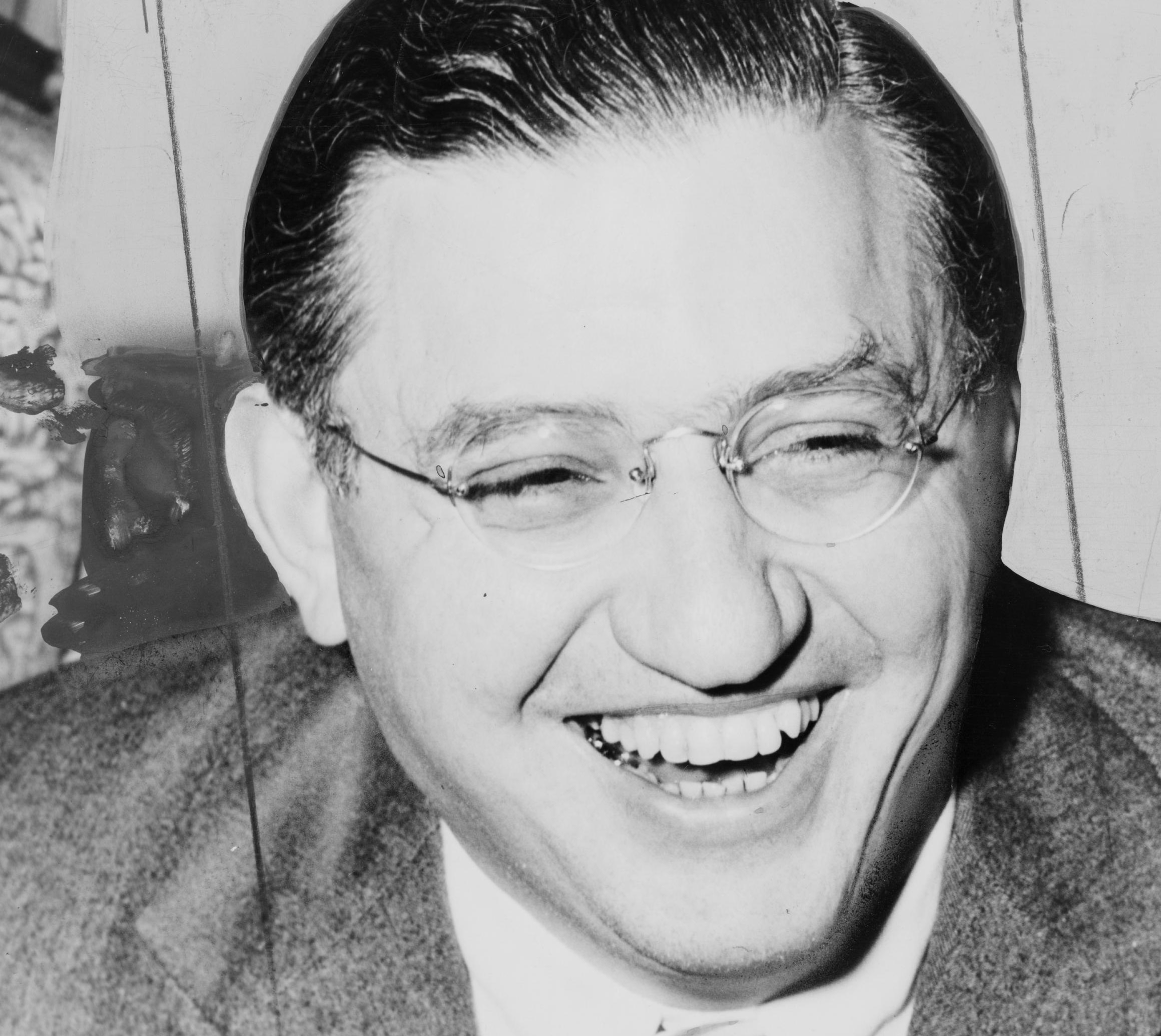 David O. Selznick in suit smiling