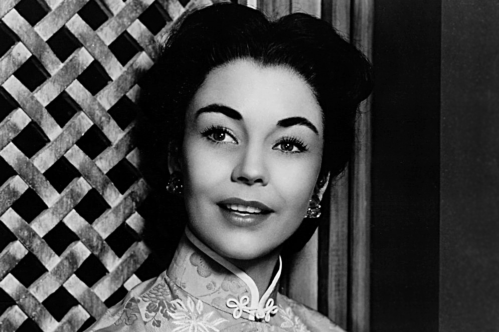 Jennifer Jones in shiny top