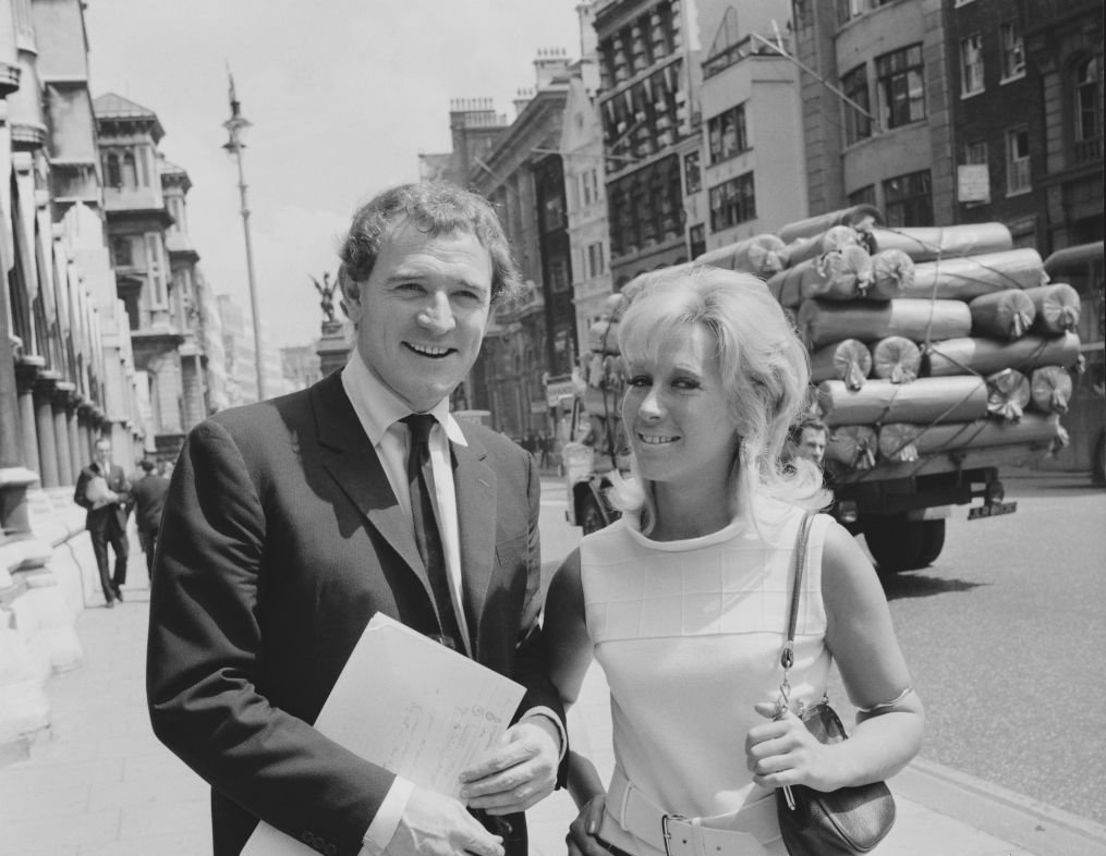 Irish actor and singer Richard Harris (1930 - 2002) with his wife, Welsh socialite Elizabeth Rees-Williams outside the Royal Courts of Justice