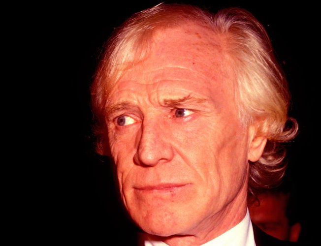 Actor Richard Harris leaves the Four Seasons Hotel.