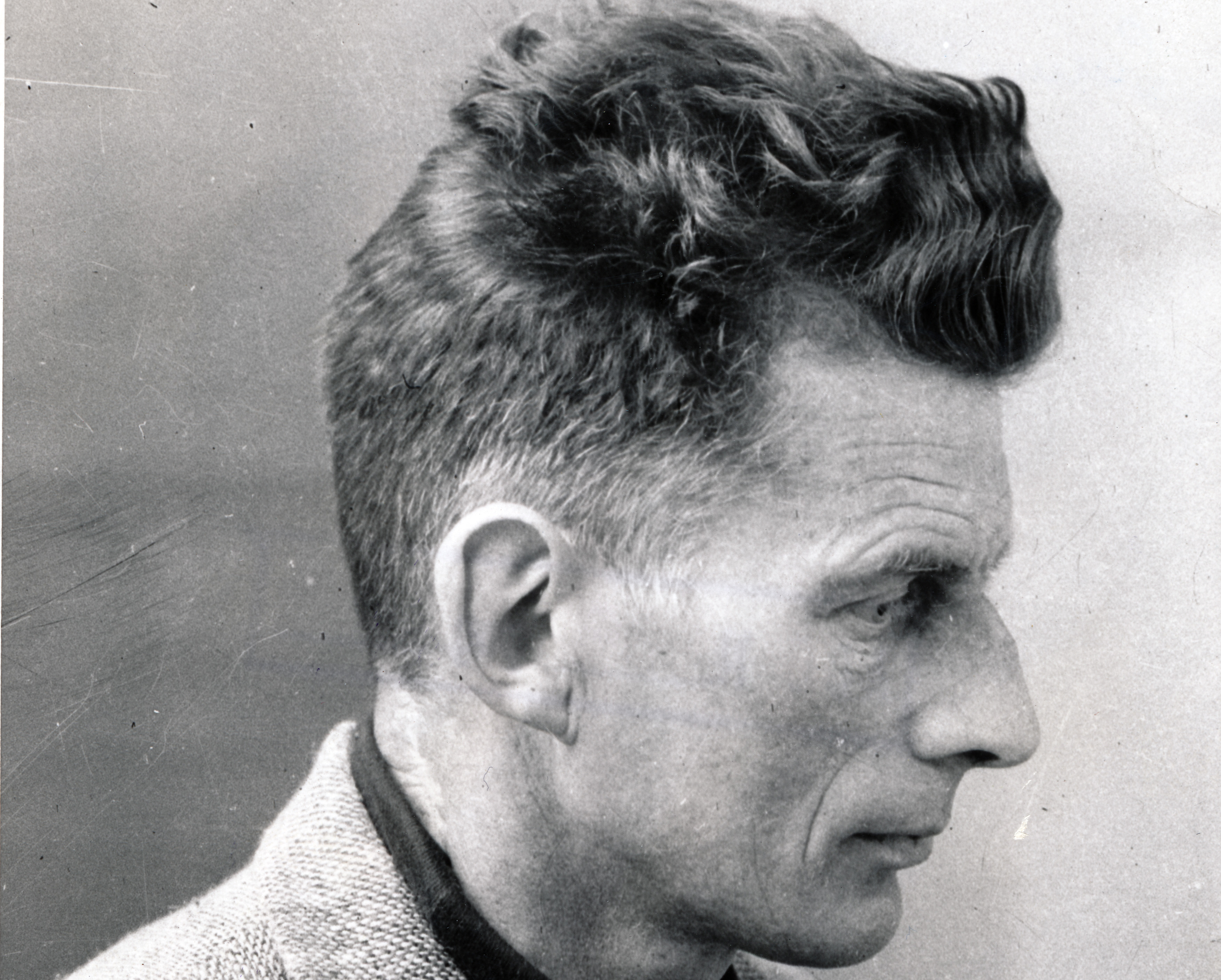 Samuel Beckett seen from the side