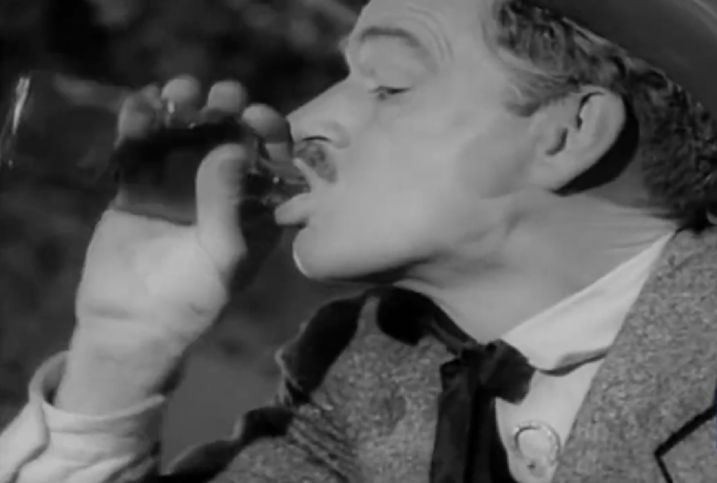 Screenshot of Black Bart (Arthur Space) drinking - from Stories of the Century (1954-55)