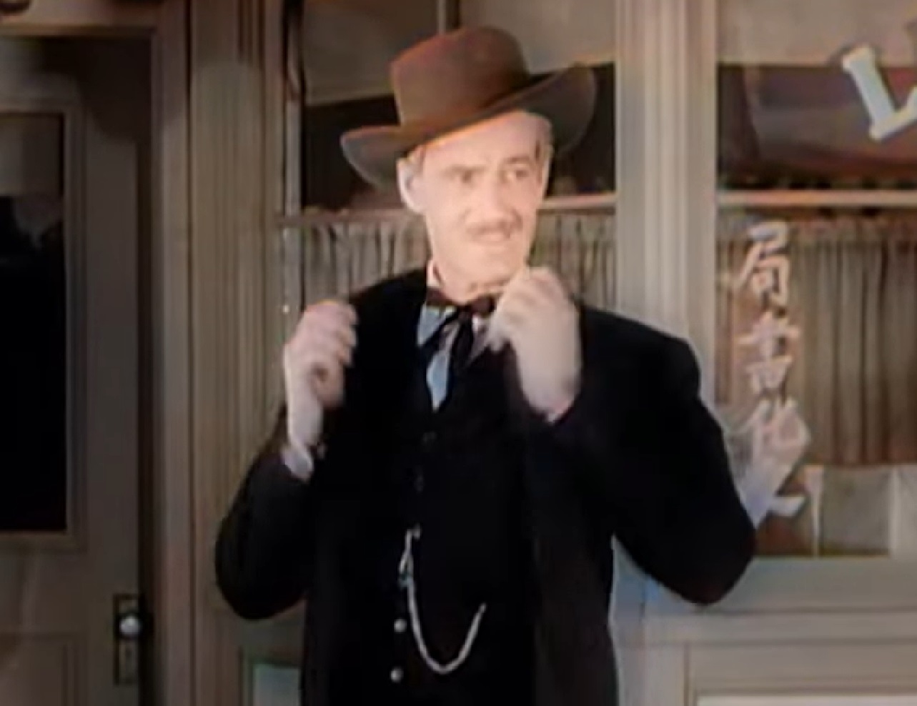 Screenshot of Black Bart (Arthur Space) standing outside - from Stories of the Century (1954-55)