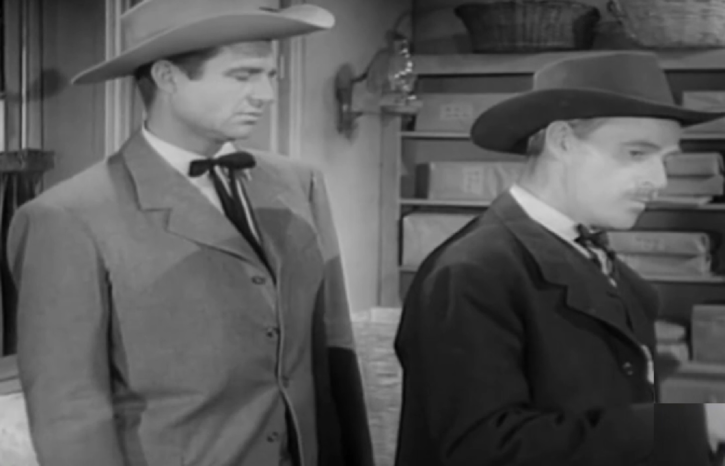 Screenshot of Black Bart (Arthur Space) is talking with other man - from Stories of the Century (1954-55)