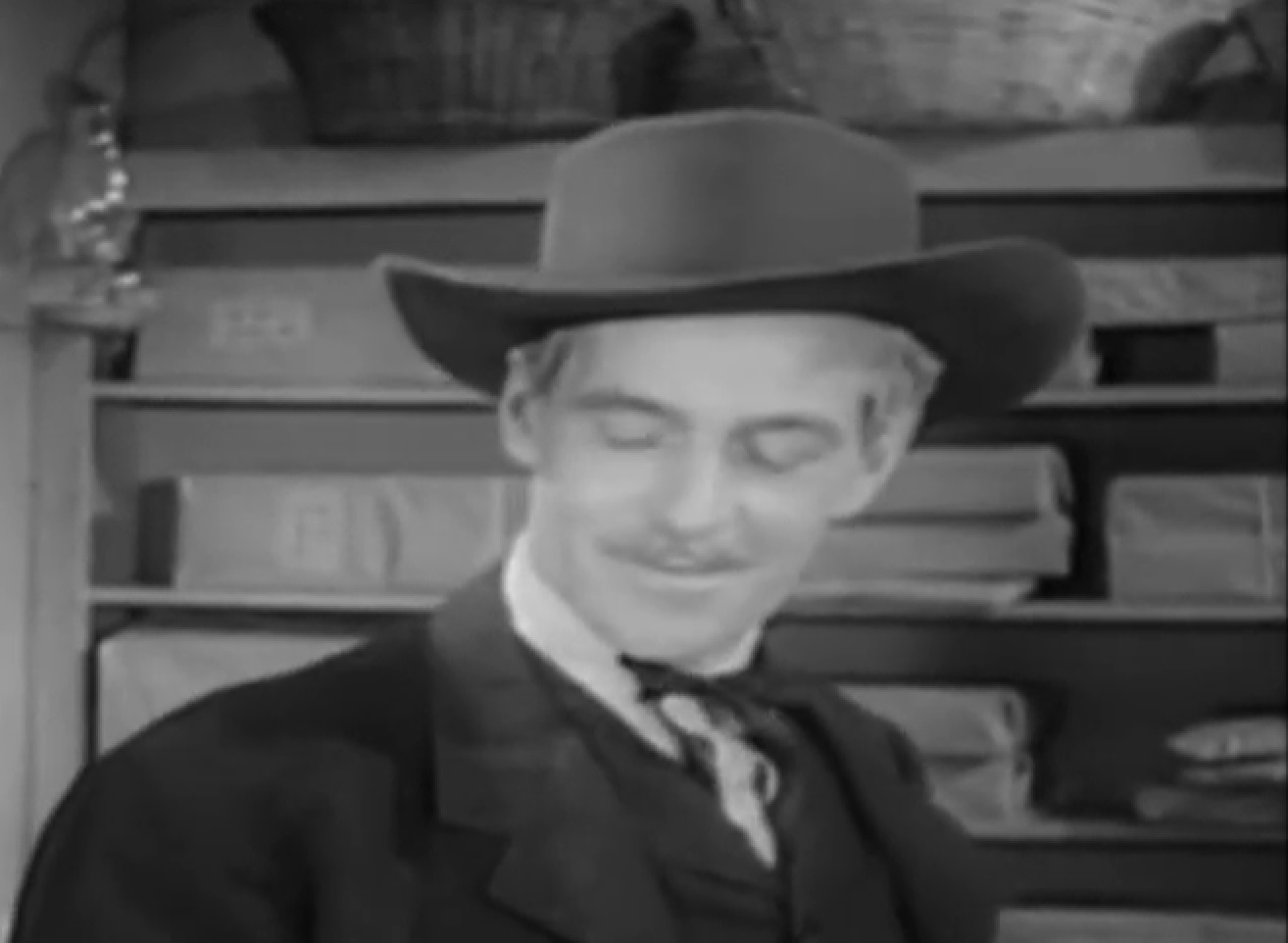 Screenshot of Black Bart (Arthur Space) looking down - from Stories of the Century (1954-55)