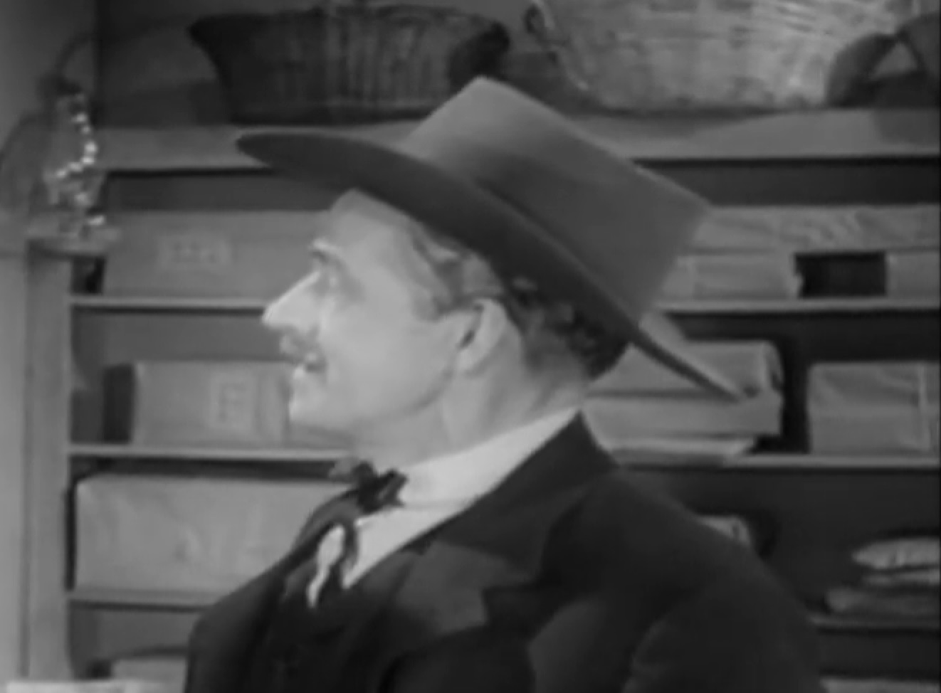 Screenshot of Black Bart (Arthur Space) wearing hat and looking at side - from Stories of the Century (1954-55)