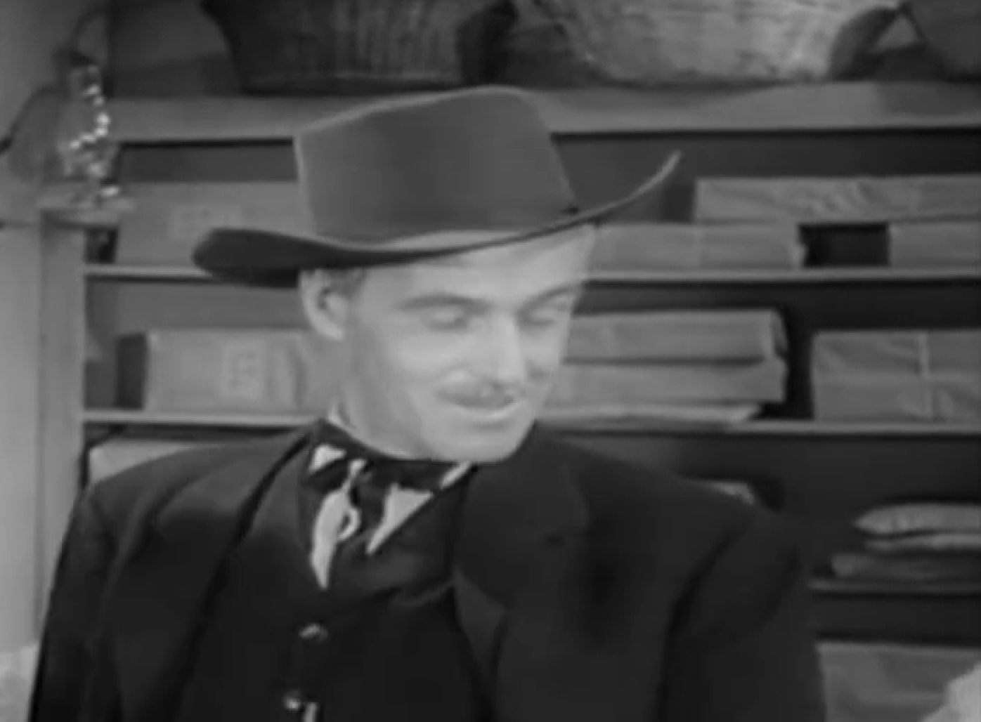 Screenshot of Black Bart (Arthur Space) looking down - from Stories of the Century (1954-55)