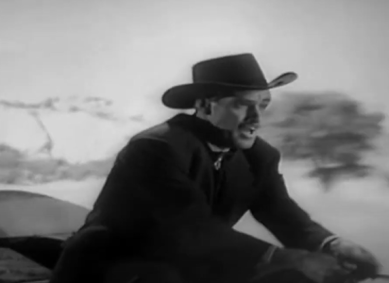 Screenshot of Black Bart (Arthur Space) riding a horse - from Stories of the Century (1954-55)