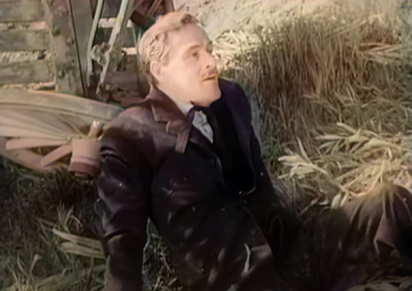 Screenshot of Black Bart (Arthur Space) seating on the floor - from Stories of the Century (1954-55)