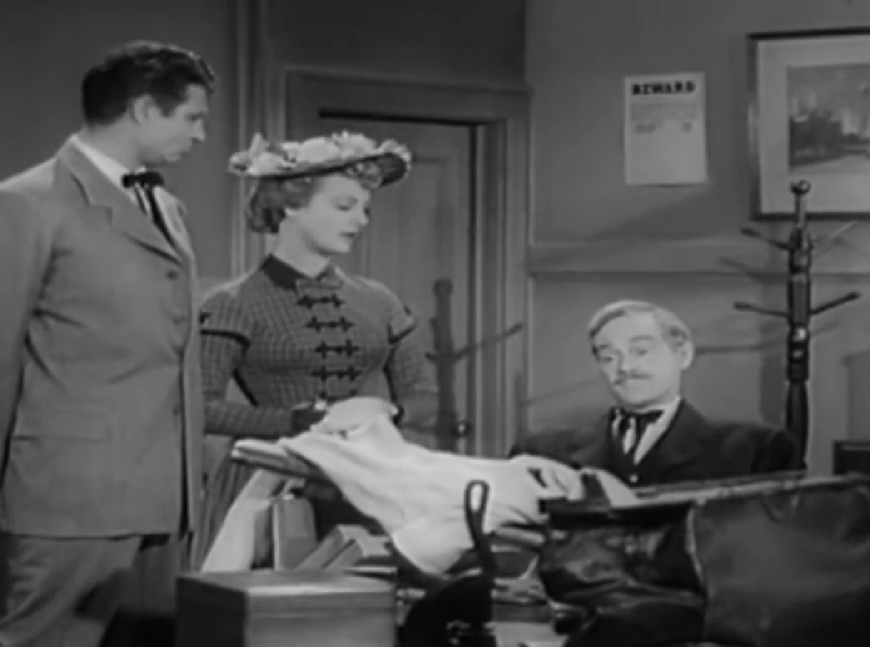 Screenshot of Black Bart (Arthur Space) seating in police office - from Stories of the Century (1954-55)