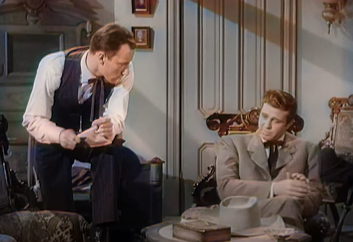 Screenshot of Sheriff Bascome talking with other man in his office - from Stories of the Century (1954-55)