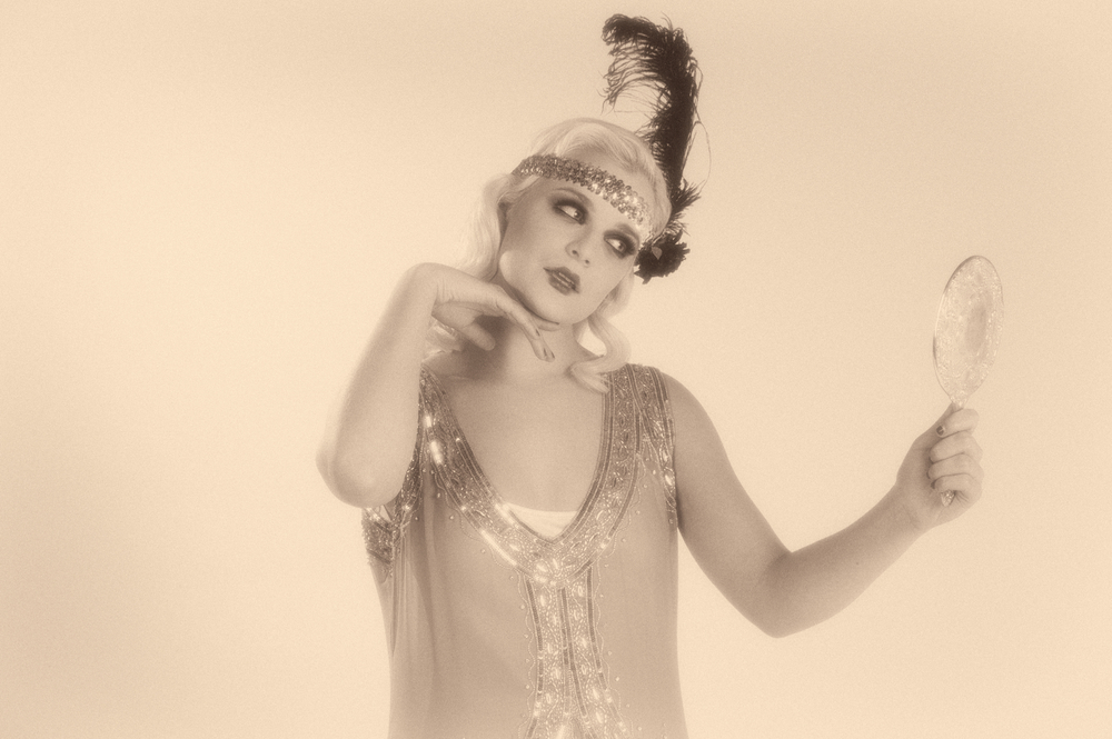 1920's style flapper girl in sepia tone