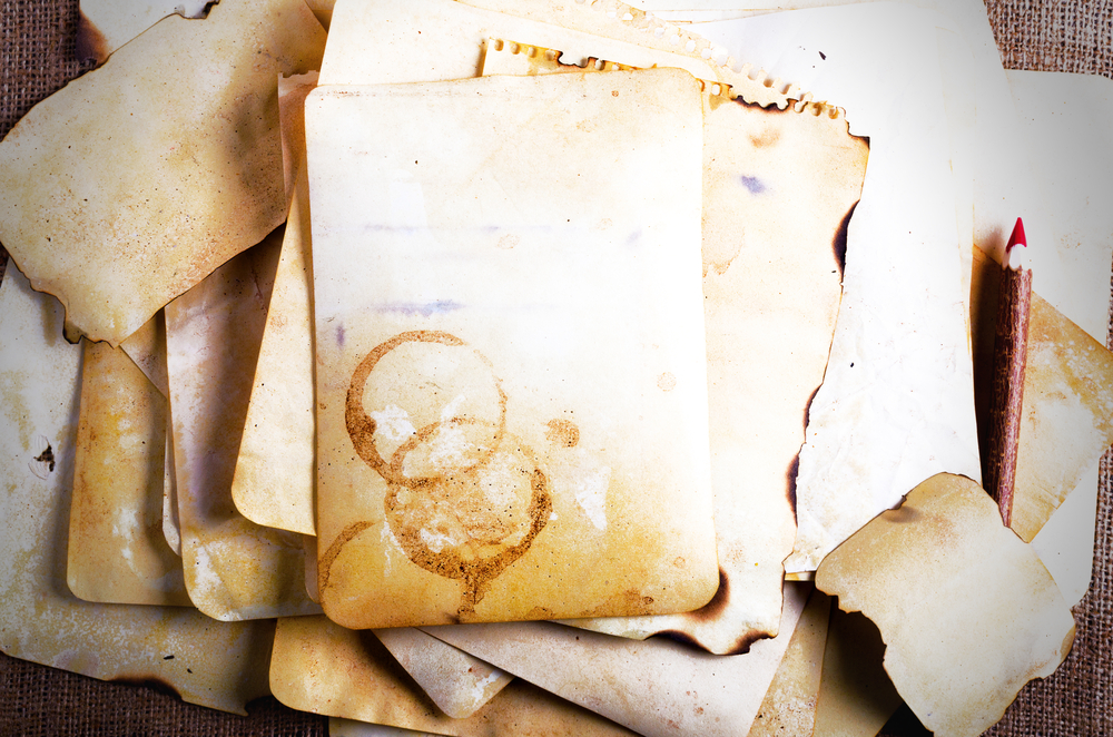 Vintage old papers, notes, pensil, on burlap, sackcloth background. Vintage and retro design effects.