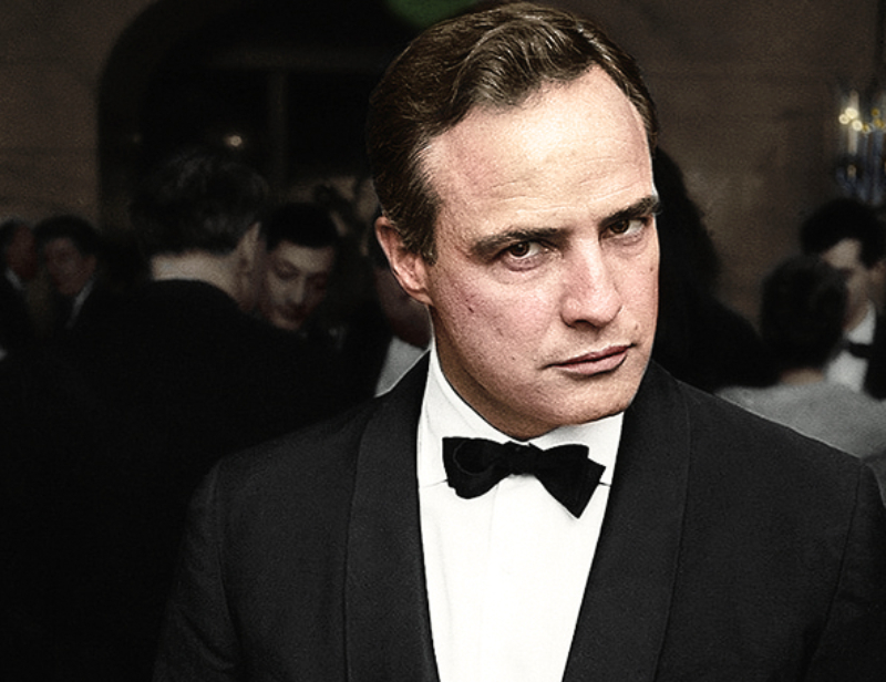 Marlon Brando in tuxedo looking at the camera