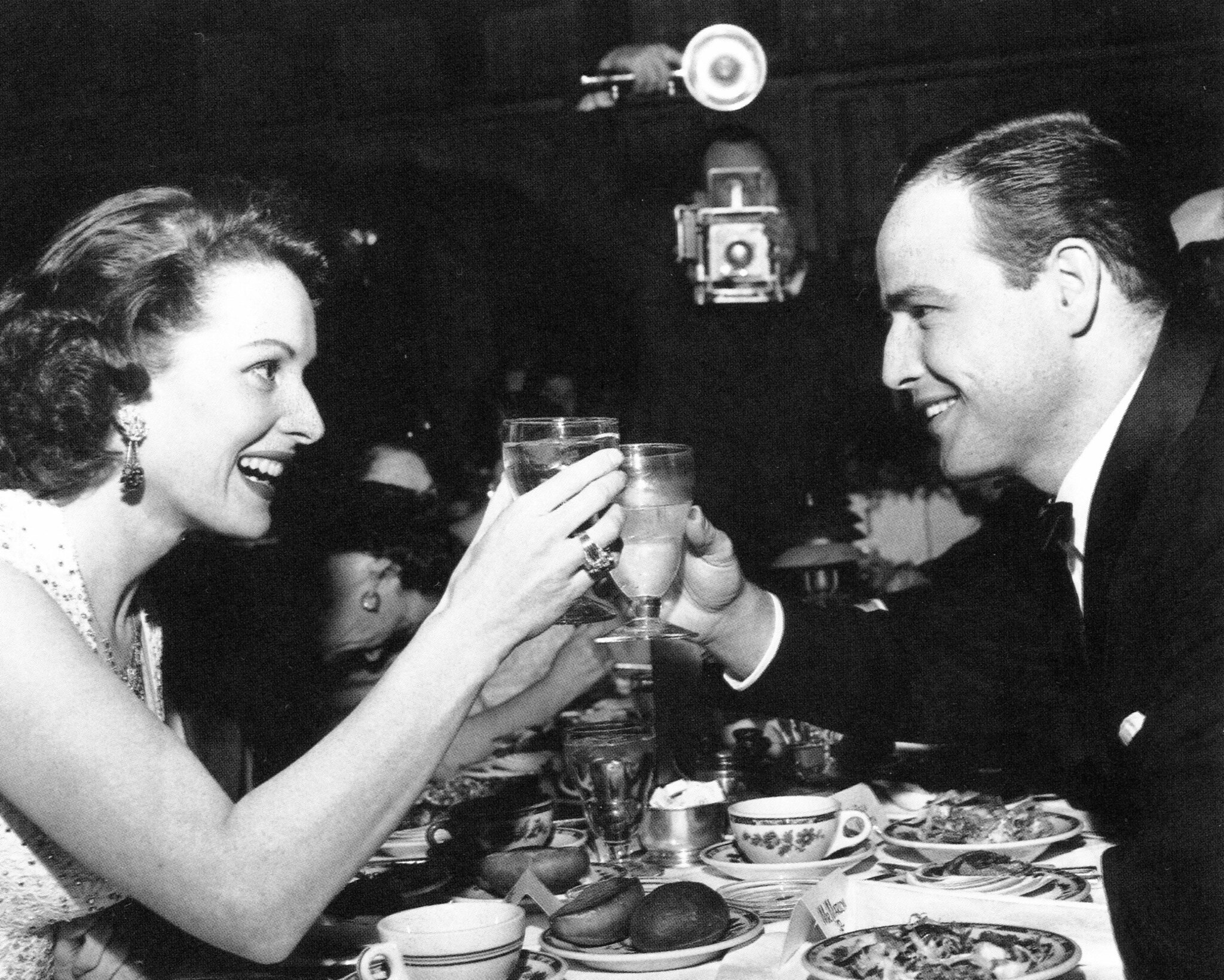 Maureen O'Hara and Marlon Brando at a dinner