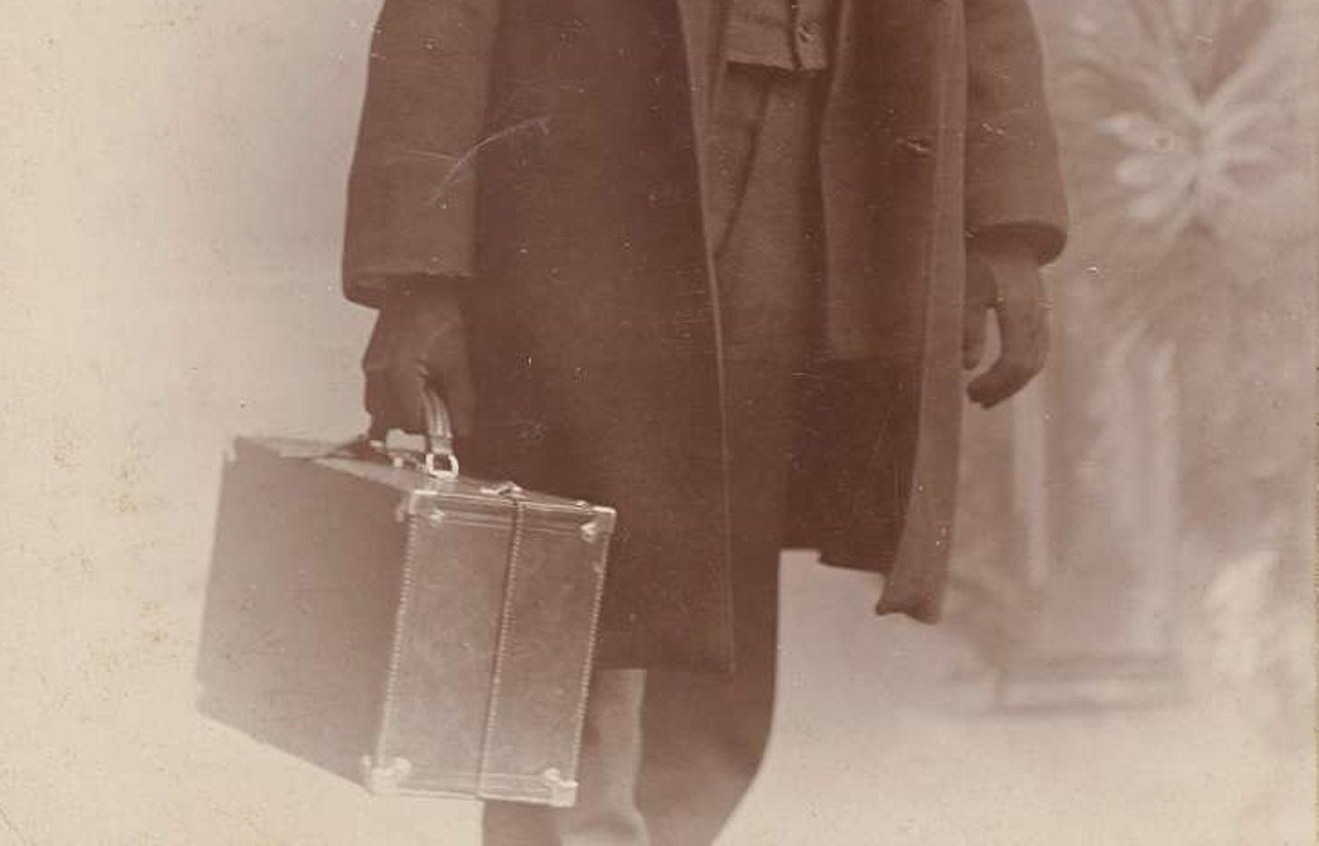 Man with suitcase - B&W photo