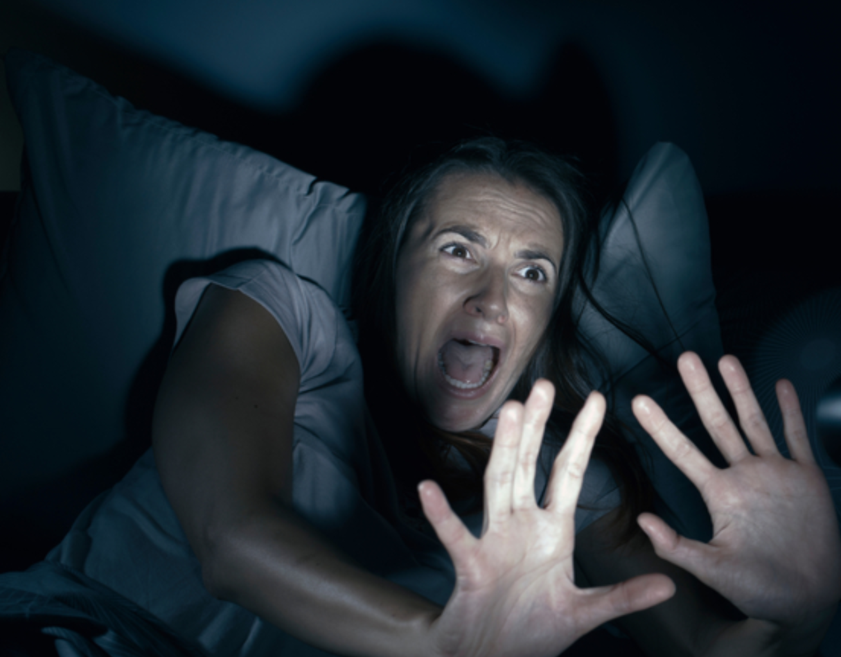 Scared woman woke up to light pointing up to