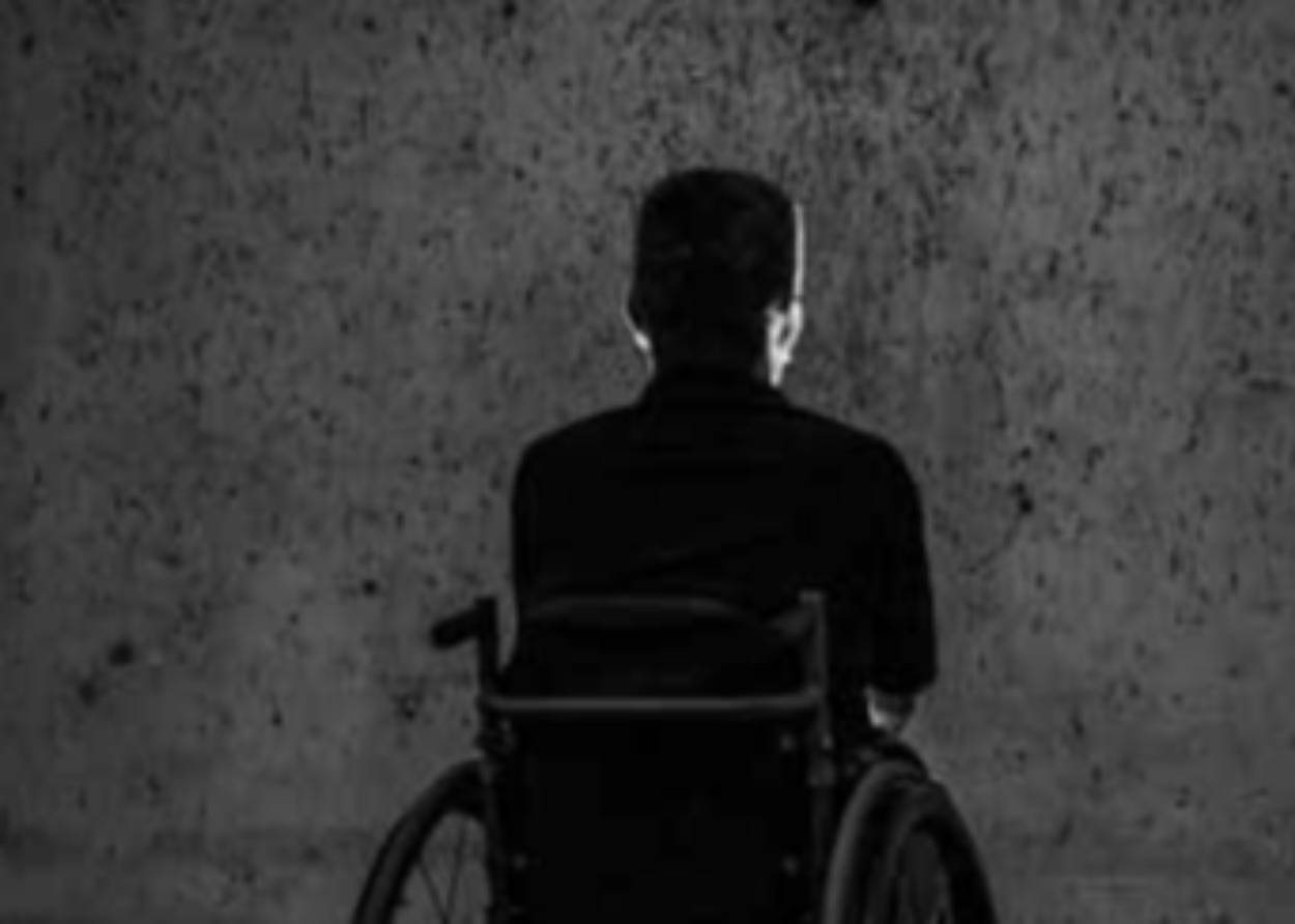 Man Sitting on Wheelchair