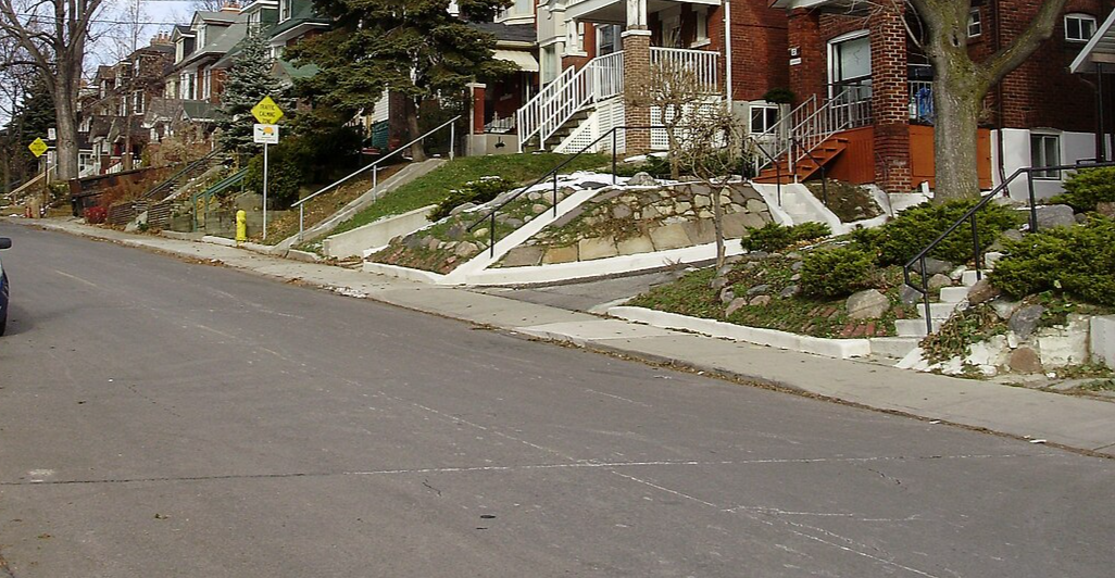 Houses line Alberta Avenue in the Wychwood neighbourhood of Toronto, Ontario, Canada. - 2008