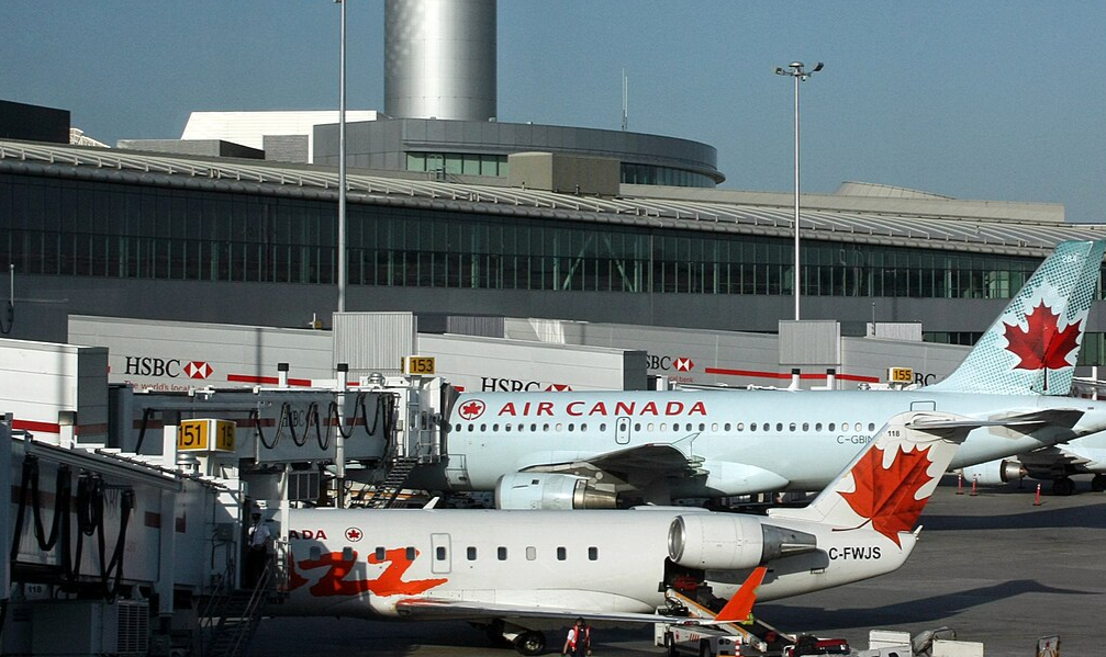 Terminal 1 of Toronto Airport with Air Canada aircraft and the tower - 2011
