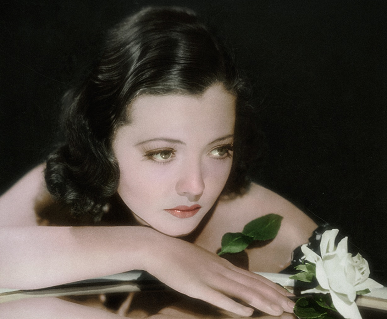 Portrait of Sylvia Sidney looking at side.