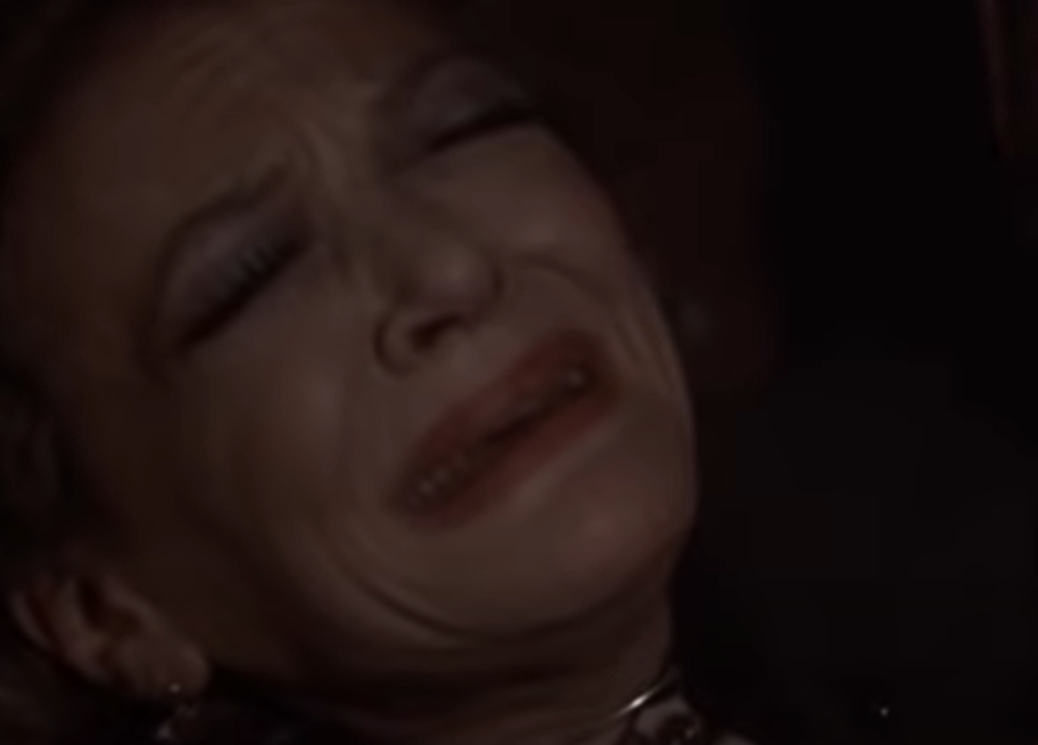 Screenshot of Sylvia Sidney crying  - from Summer Wishes, Winter Dreams (1973)