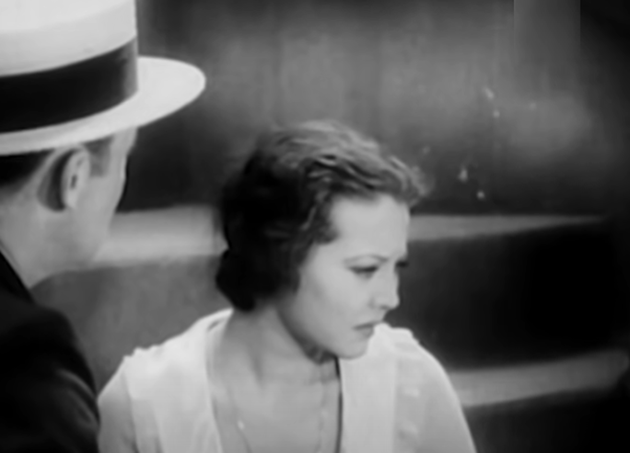 Screenshot of Sylvia Sidney looking at side.