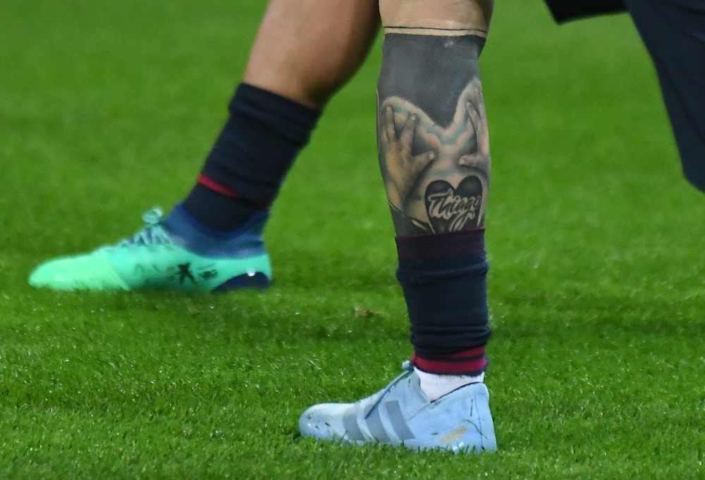 Lionel Messi tattoo on his leg