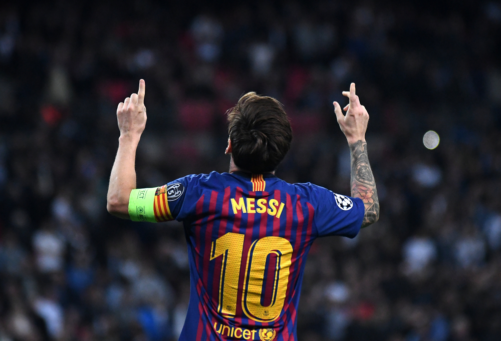 Lionel Messi celebrates after a goal score