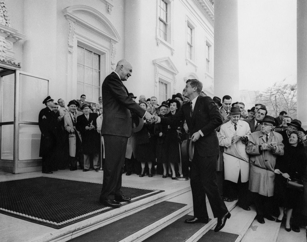 President Dwight D. Eisenhower greets President-elect John F. Kennedy