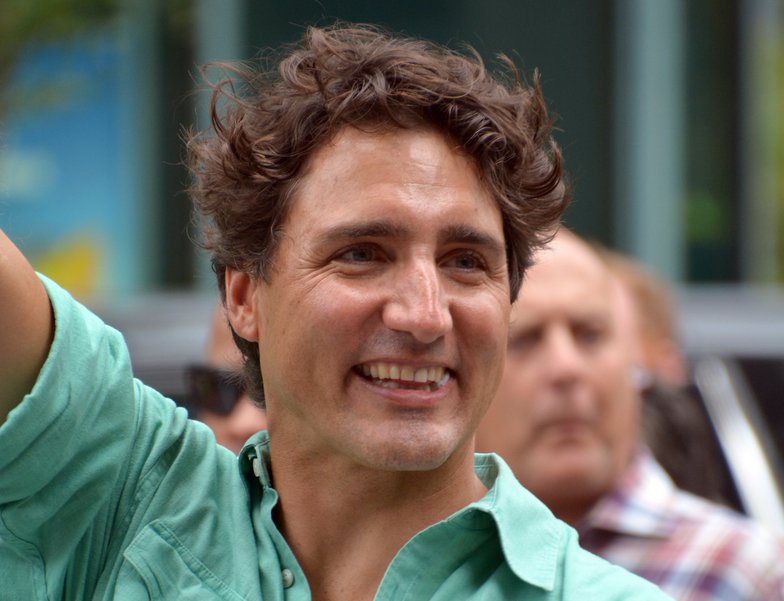 Portrait Photo of Justin Pierre James Trudeau in green shirt