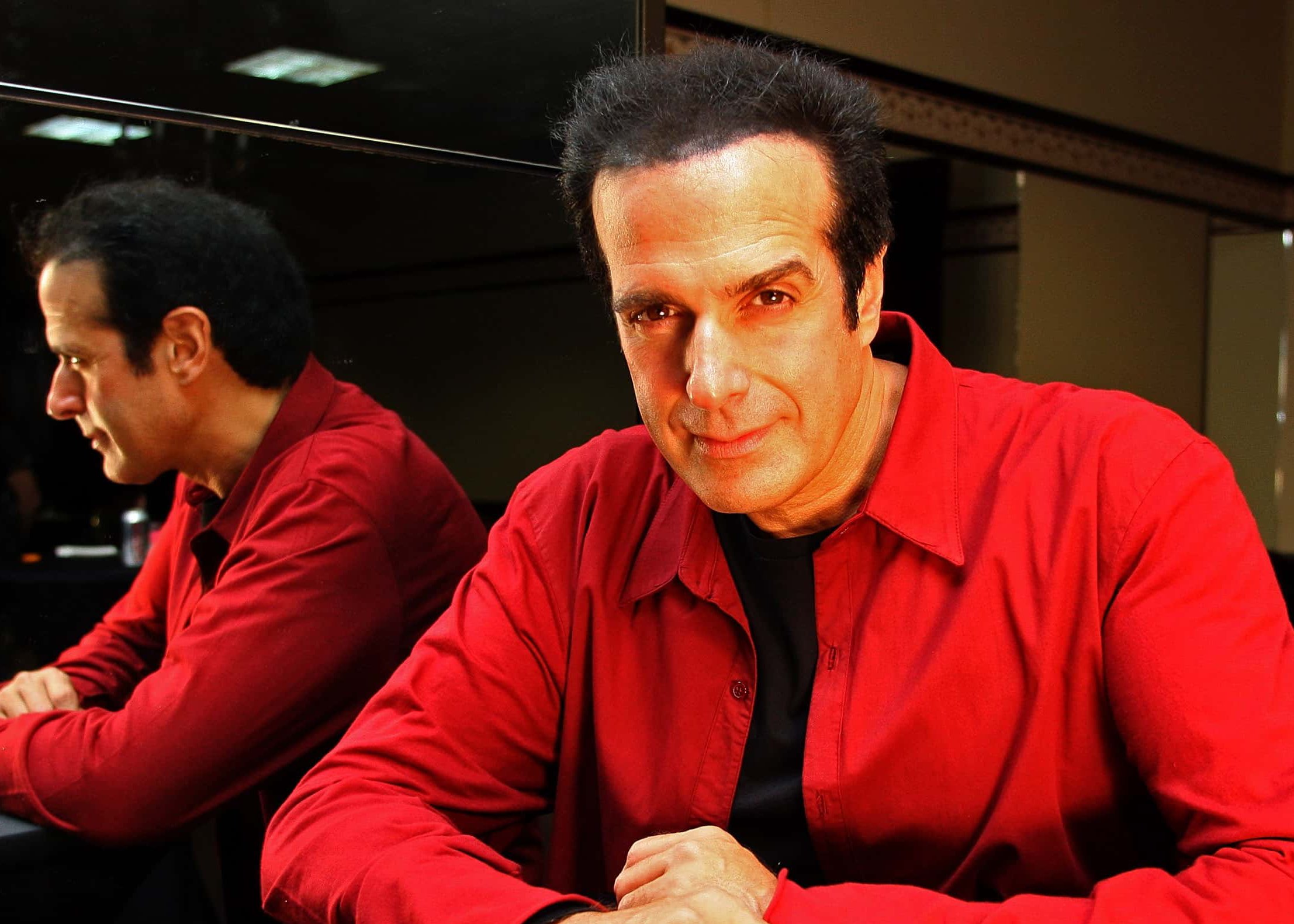 Magician David Copperfield poses for a photo after holding a photo call to launch his first Australian show in 10 years