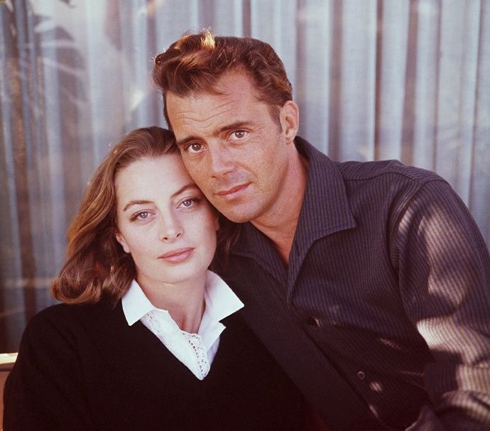 Model Capucine and Dirk Bogarde together