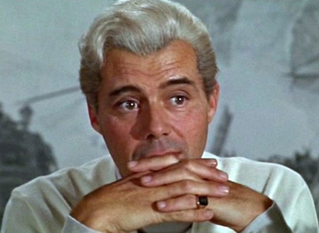 Photo of Dirk Bogarde with white shirt