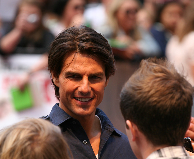 Tom Cruise wearing a blue shirt