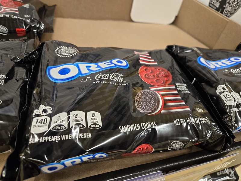 Coca Cola flavored Oreos placed on a market rack