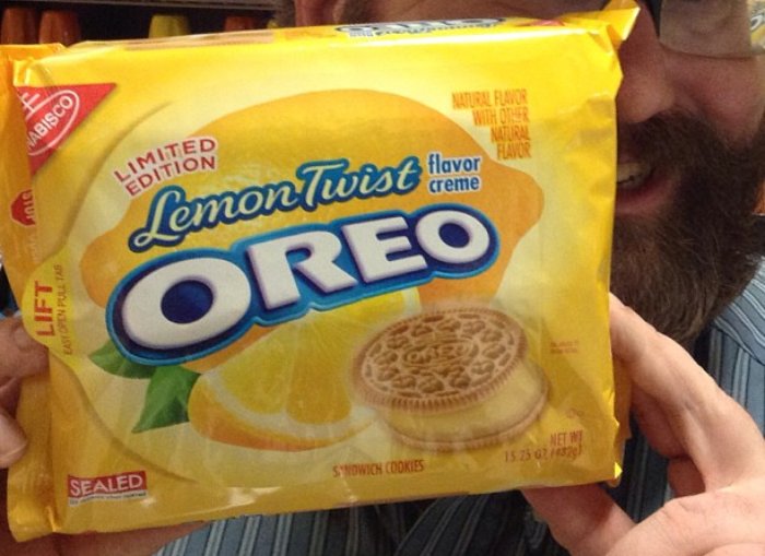 Person Holding Lemon Twist Flavor Oreo Cookies